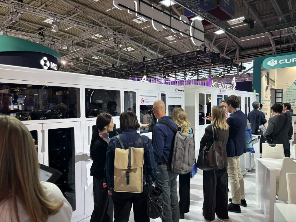 ntegrated diagnostics platform displayed at ESCMID Global 2026 with laboratory systems and clinical decision-support messaging.